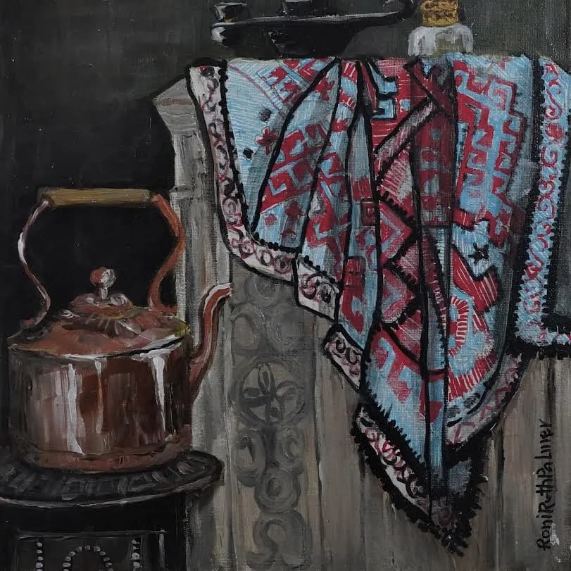 Copper kettle and woven tablecloth