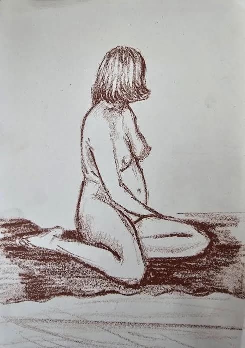 Seated pregnant woman